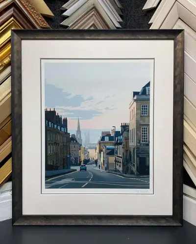Print of a Bath street scene with a cream mount and bronze frame framed by Tripps of Keynsham