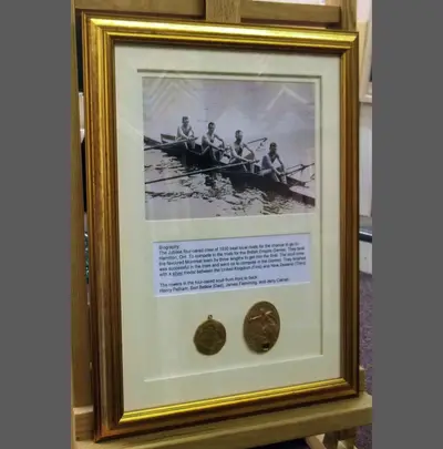 Rowing photograph and medals framed in gold framed by Tripps of Keynsham