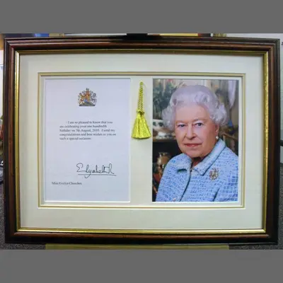 Royal letter and photograph framed with a cream double mount framed by Tripps of Keynsham