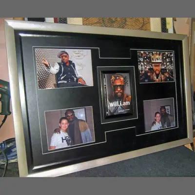 Photo and memorabilia collage on a black multi-aperture mount framed by Tripps of Keynsham