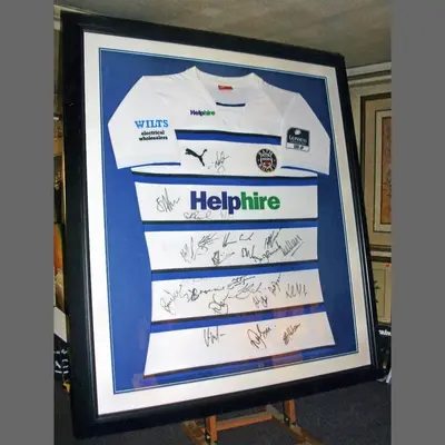 Signed blue and white rugby shirt in a navy box frame framed by Tripps of Keynsham