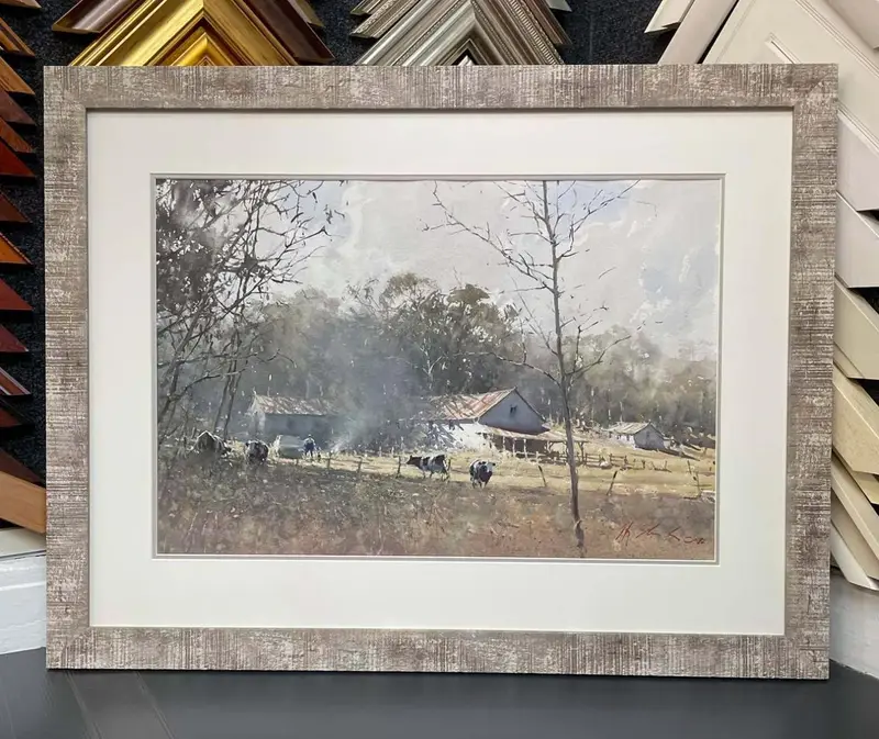 Watercolour landscape in a limed wood frame framed by Tripps of Keynsham
